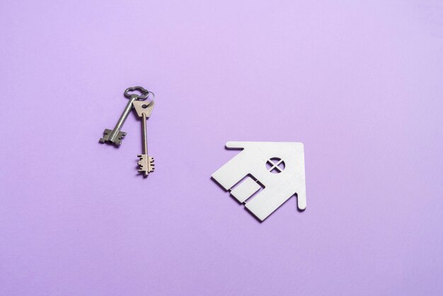 A flat lay of home keys on the table symbol of real estate investment