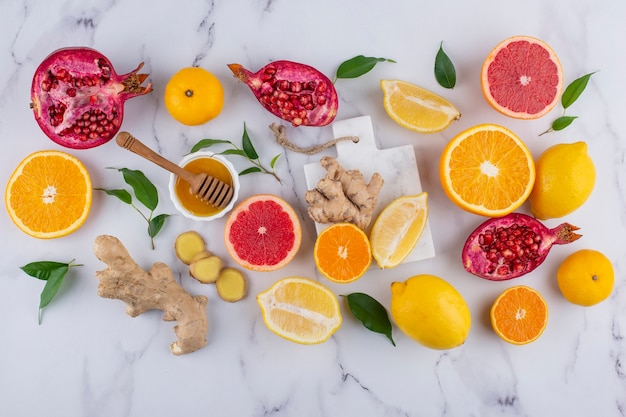 Flat lay of immunity boosting foods with citrus and ginger