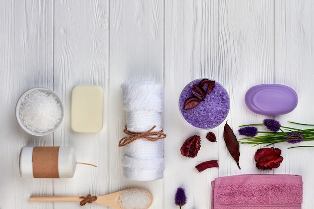 Photo flat lay items for spa treatment on white wooden desk