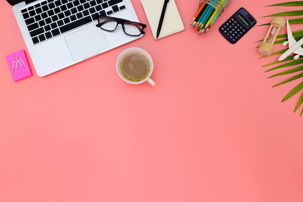 Flat lay office workspace with blank laptop