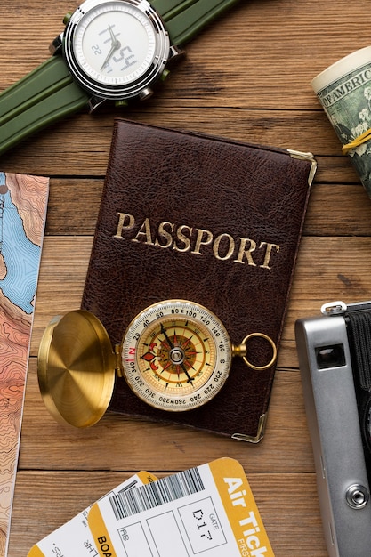 Flat lay passport, compass, tickets