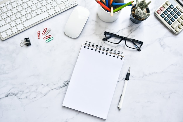 Flat lay photo of workspace.  Top view mock up notebooks