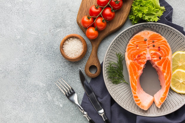 Flat lay plate with salmon and lemon