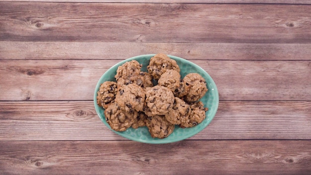 Flat lay. Step by step. Freshly baked chewy oatmeal raising cookies.