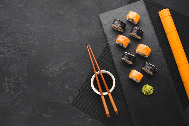 Flat lay sushi arrangement with copy space