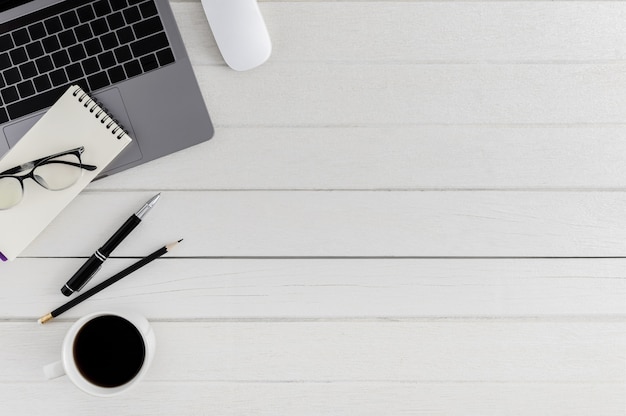 Flat lay, top view wooden office desk