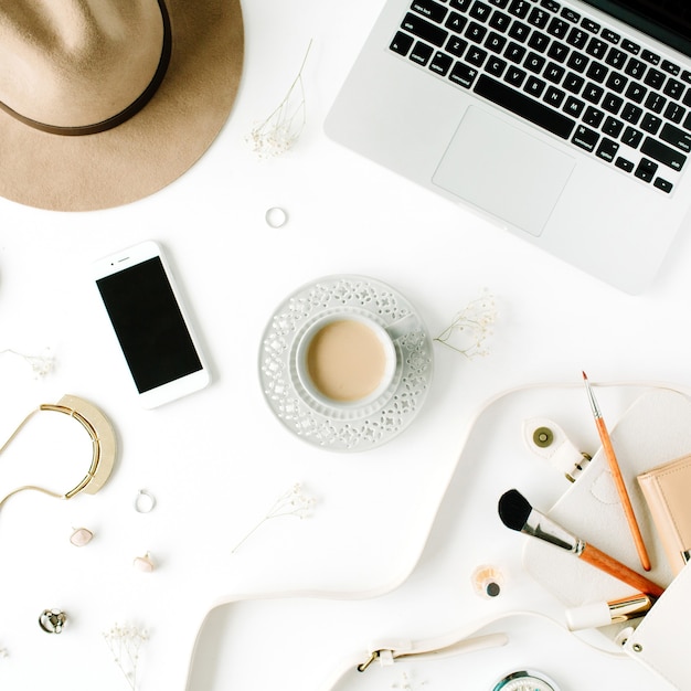 Flat lay trendy feminine home office workspace.