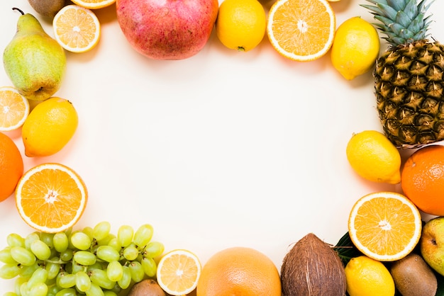 Flat lay of tropical and citrus fruits