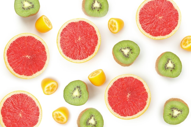 Flat lay with exotic fruits on white background.