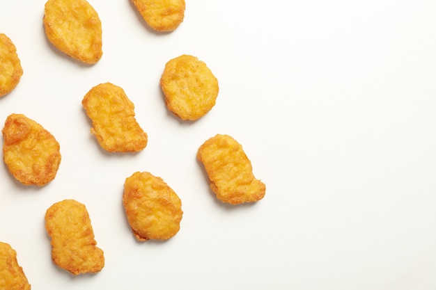 Flat lay with fried chicken nuggets