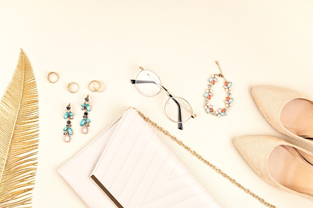 Flat lay with woman fashion accessories in yellow and blue colors. Fashion blog, summer style, shopping and trends idea