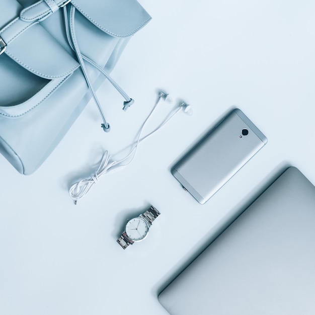 Flat lay with woman staff on white background