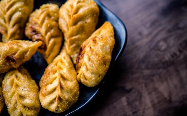 flat layout of delicious fast food fried Momo or dumplings at Kathmandu Nepal