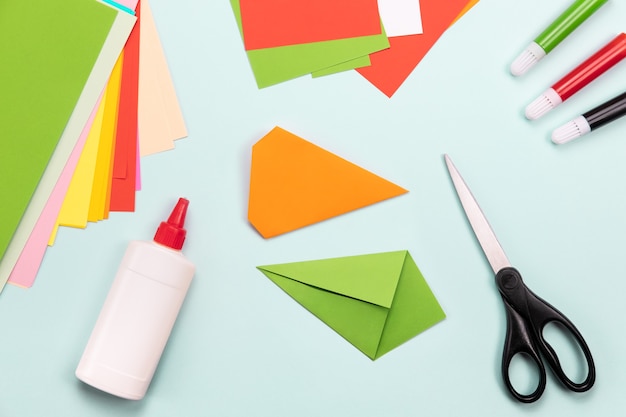 Photo flatlay paper craft. origami concept. carrot bookmark