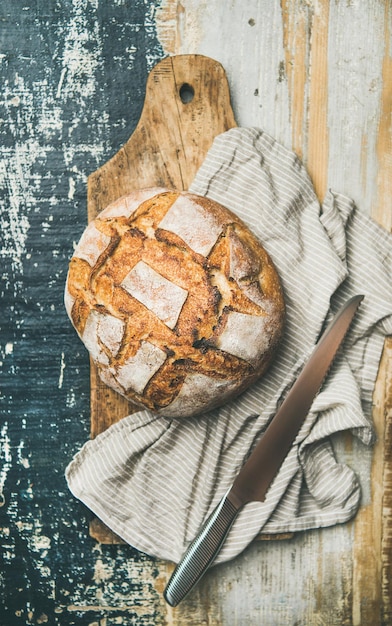 Flatlay of sourdough wheat bread over linen napkin