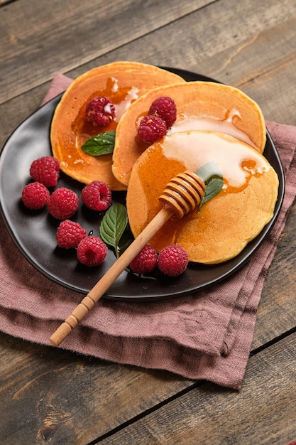 flavored pancakes with honey and fresh raspberries for breakfast great breakfast dessert