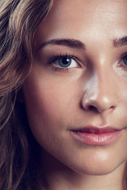 Flawless femininity Portrait of a beautiful young woman in studio