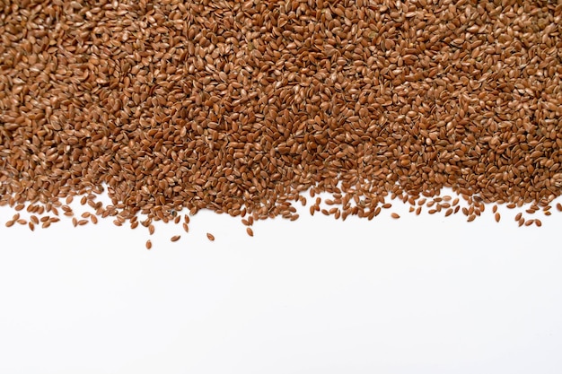 Flax seeds on white background.Copy space.