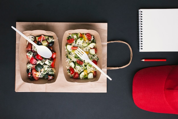 Flay lat arrangement with salads on paper bag