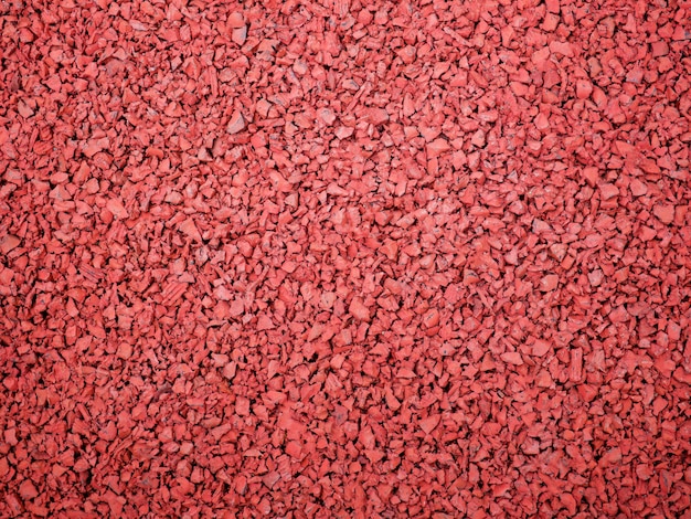 Flexible red tile for playground Tiles made from a mixture of rubber crumb