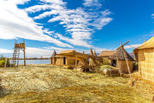 Floating Islands on Lake Titicaca Puno Peru South America Dense root that plants Khili interweave form natural layer about one to two meters thick that support islands