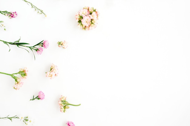 Floral background with pink and beige wildflowers design