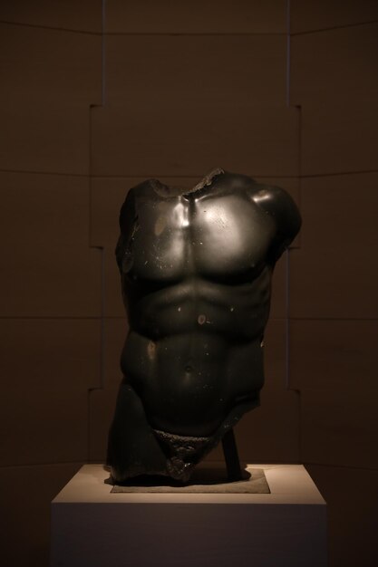 Photo florence italy february 8 2024 sculpture of doryphoros torso at uffizi gallery