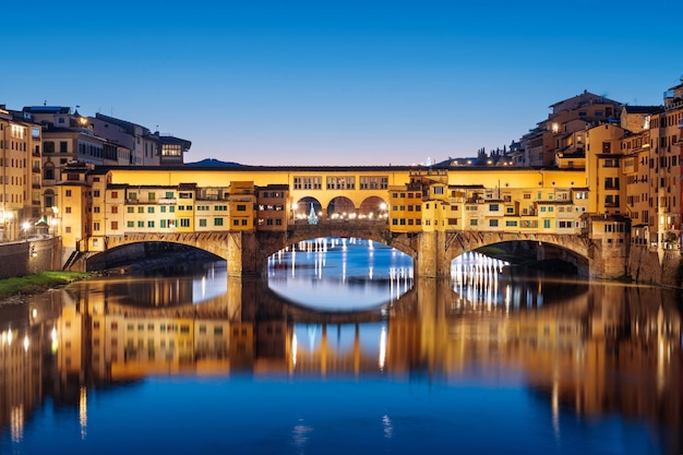 Florence Italy at the Ponte Vecchio Bridge crossing the Arno River