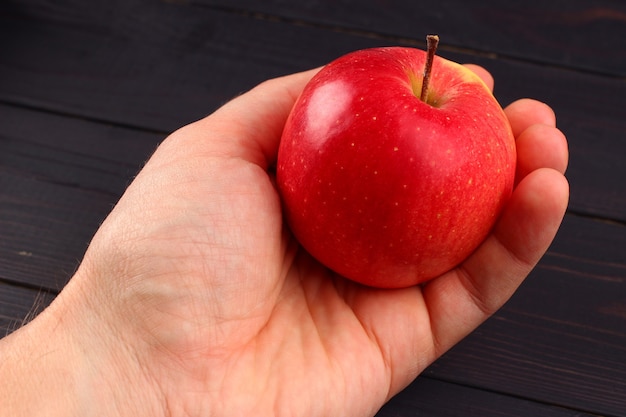 Florin's red apple in hand