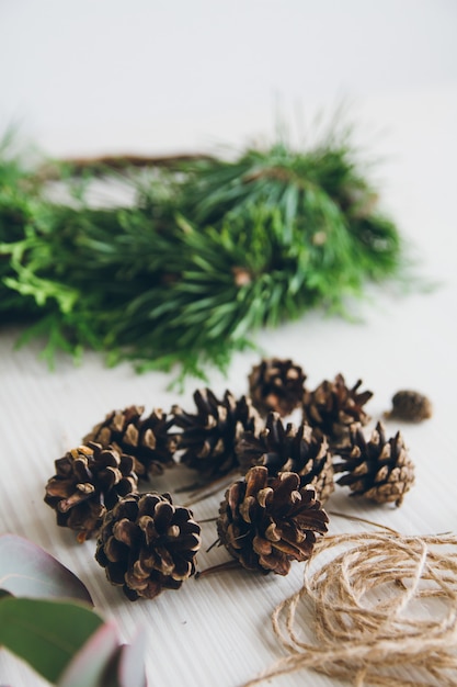 Florist decorator making Christmas wreath 