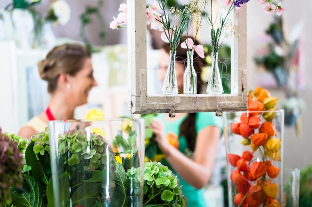 Florist woman and customer in flower shop