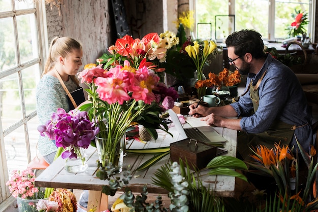 Florists working in a flower shop