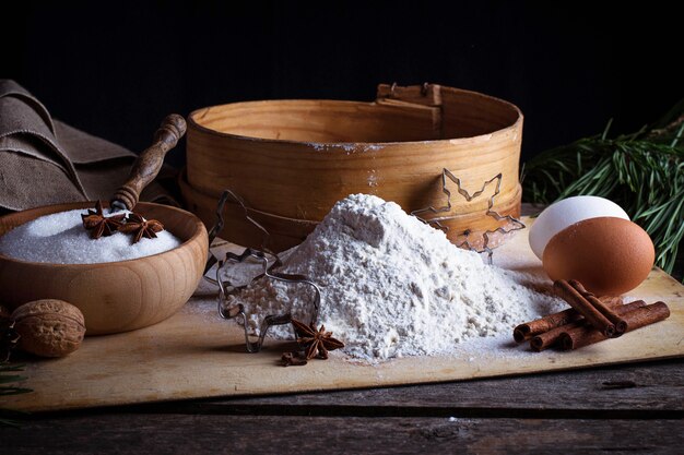 Flour, sieve and eggs. Selective focus