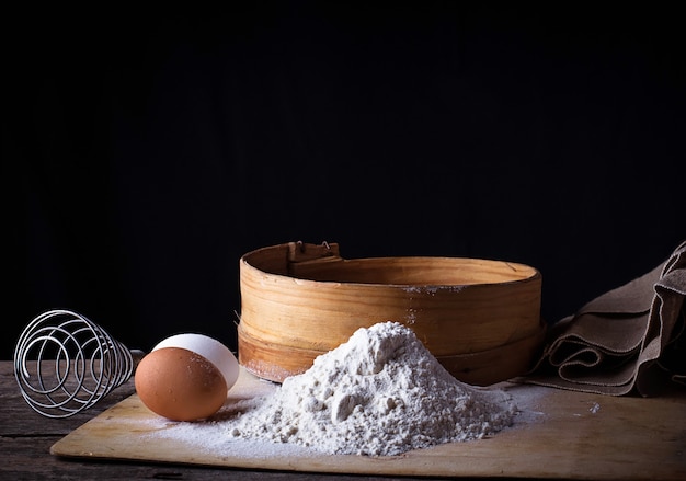 Flour, sieve and eggs