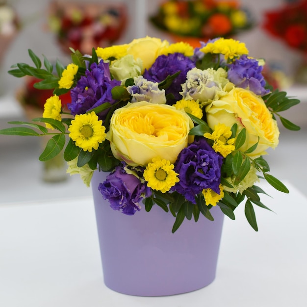 flower delivery floristic flower arrangement on the table Fresh flowers in a box