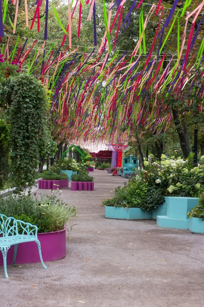 flower park with a bench Landscaping decorated park in the city