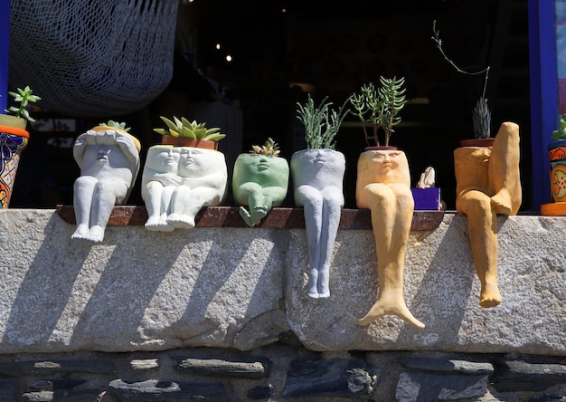 Flower in a pot on the windowsill Pots in the shape of men Home Decorations