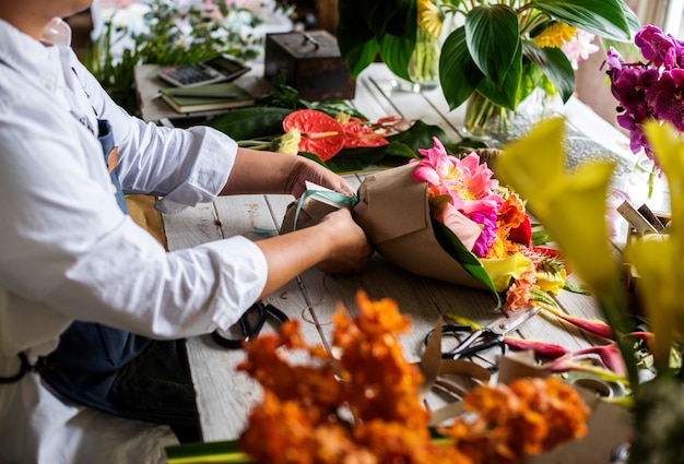 Flower shop business owner working service