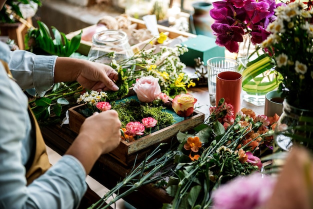 Flower shop business owner working service