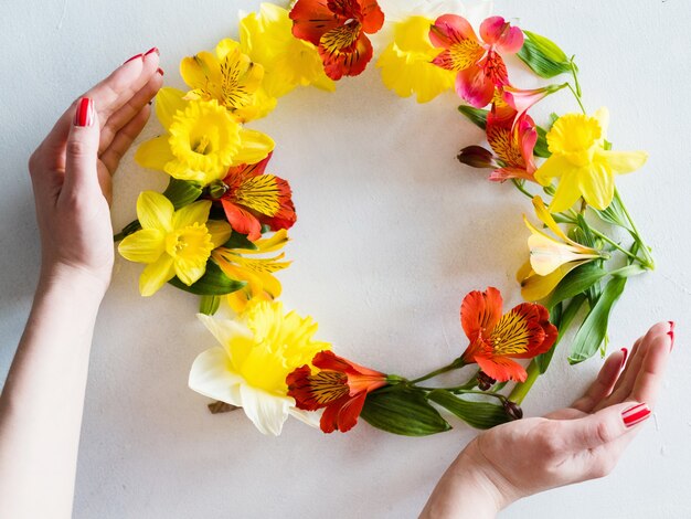 Flower wreath on white background.