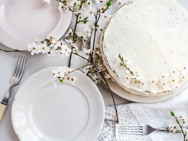 Flowering tree and fresh, homemade cake. Close-up