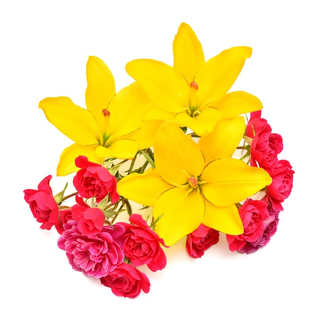 Flowers yellow lilies and pink roses with leaves isolated on white background Beautiful bouquet Creative spring concept Floral pattern object Flat lay top view