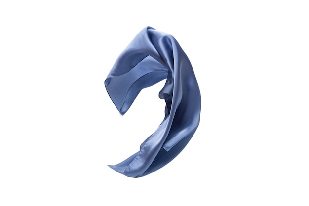 Flowing blue silk scarf isolated on white background.