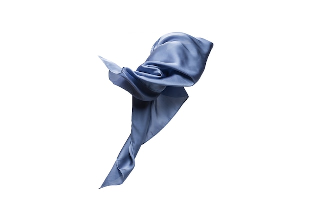 Flowing blue silk scarf isolated on white.