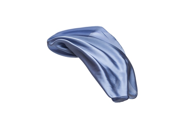 Flowing blue silk scarf isolated on white.