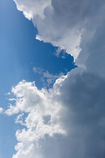 Fluffy clouds blue sky