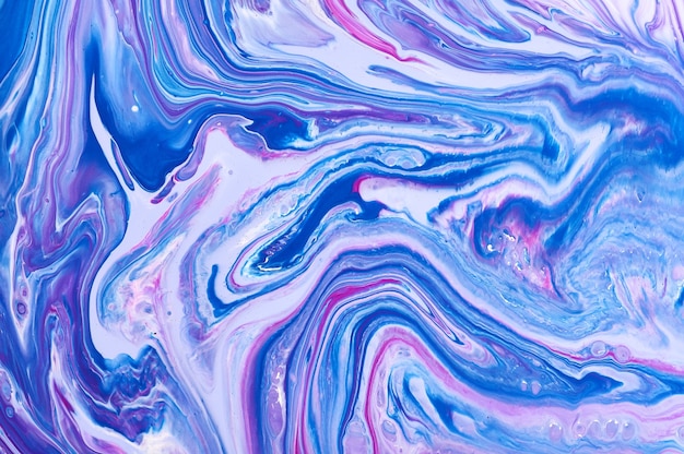 Fluid Art. Abstract colorful background, wallpaper. Mixing  paints. Modern art. Marble texture