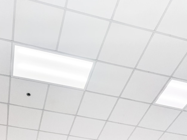 Fluorescent lamp on the modern ceiling