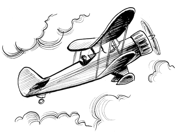 Photo flying retro biplane ink black and white drawing