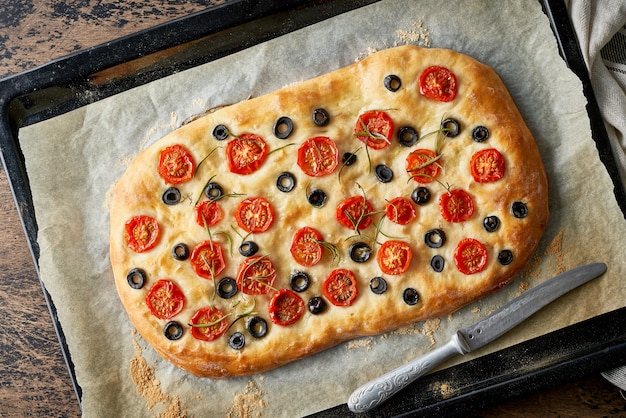 Focaccia with tomatoes and olives